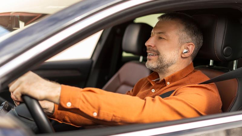 Driver with earbuds 1